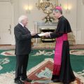 Archbishop Charles Brown, the new apostolic nuncio to Ireland, presents his credentials to Irish President Michael Higgins at the residence of the president in Dublin Feb. 16. In brief remarks to Higgins, Archbishop Brown, a native of New York, said Pope Benedict XVI had asked him to &quot;solidify and strengthen&quot; the relations between Ireland and the Holy See.