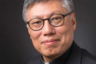 Jesuit Father Stephen Chow, provincial of the Jesuits’ Chinese province, was named bishop of Hong Kong by Pope Francis May 17, 2021. The 61-year-old bishop-designate was born in Hong Kong. He is pictured in a 2016 photo.
