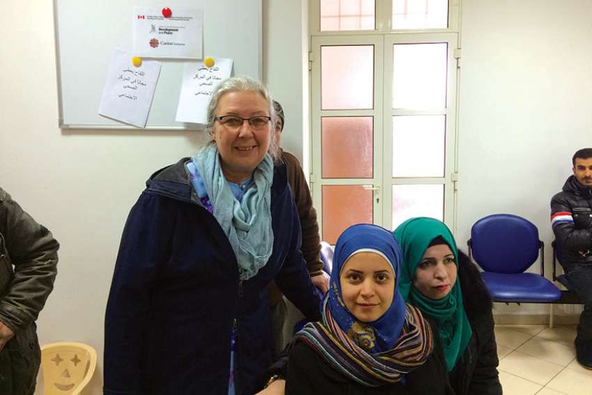 Hélène Tremblay-Boyko with two Syrian refugees, Ghada and Iblissam, at the Caritas Lebanon Medical Centre in Rayfoun (one of 10 throughout Lebanon) which provide medical services to refugees.
