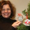 Jane Twohey, a Military Christian Fellowship of Canada volunteer, shows the Christmas ornaments she is helping sell to support Canada’s newest war veterans.  