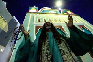  A Muslim man is pictured in a file photo praying outside a mosque in Khartoum, Sudan. Sudanese bishops are welcoming a new declaration signed in early September that separates religion and state.