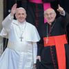 Newly-elected Pope Francis, Cardinal Jorge Mario Bergoglio of Argentina, waves after praying at the Basilica of St. Mary Major in Rome March 14. At right is Cardinal Agostino Vallini, papal vicar for Rome.