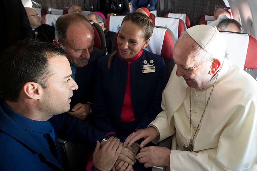  Pope Francis performs an impromptu wedding ceremony for Latam Airlines employees Carlos Ciuffardi Elorriaga, 41, and Paula Podest Ruiz, 39, aboard the pontiff&#039;s flight from Santiago, Chile, to Iquique Jan. 18.
