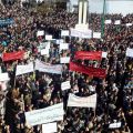 Demonstrators gather during a protest against Syria&#039;s President Bashar al-Assad near Homs Feb. 13. Intense artillery and rocket fire by government forces Feb. 11 on residential areas in Homs left at least 200 people dead, opposition activists said.