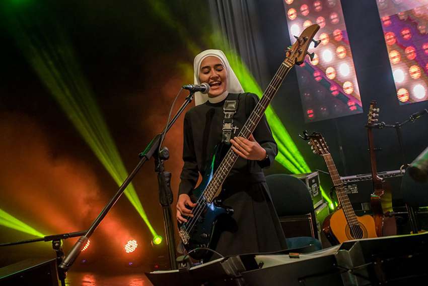 Sister Teresa, pictured, and 11 other women, who are members of the Servants of the Plan of God, have taken their inspirational music to other countries but also do social service work in Peru.