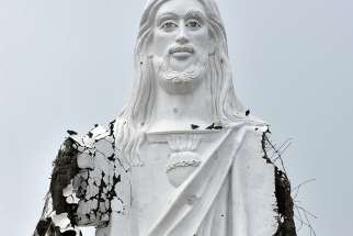  A damaged statue of Jesus Christ is seen Nov. 16 in Velankanni, India, after Cyclone Gaja hit the region that same day. More than 40 people were killed and some 82,000 displaced in state-run relief camps. 