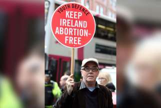 A pro-life supporter demonstrates in 2012 outside the Marie Stopes clinic in Belfast, Northern Ireland. The Catholic bishops of Northern Ireland have described as &quot;profoundly disquieting&quot; a ruling by the High Court that the region&#039;s ban on abortion in all but very limited circumstances breaches human rights legislation.