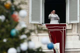  Pope Francis leads the Angelus from the window of his studio overlooking St. Peter&#039;s Square at the Vatican Dec. 8, the feast of the Immaculate Conception. 