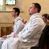 Chris Lemieux (foreground), a 40-year-old from Georgetown, Ont. and Francesco Marrone, a 30-year-old originally from Verona, Italy were ordained by Cardinal Collins at St. Michael&#039;s Cathedral May 12. 