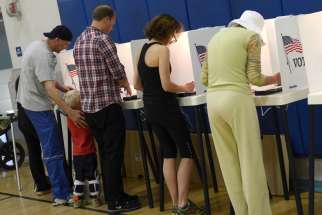 California residents vote in Palisades High School&#039;s gymnasium in this 2012 file photo.