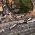 An overhead view of the wreckage of a train crash is seen July 24 in Galicia, Spain, near the pilgrimage site of Santiago de Compostela. At least 77 people died and more than 100 others were injured when the train derailed, the president of the regional government said.