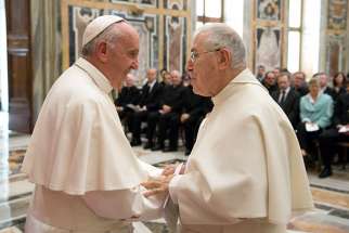 Pope Francis greets Norbertine Father Bernard Ardura, president of the Pontifical Committee for Historical Sciences, March 31 at the Vatican. The pope met with scholars taking part in a Vatican-sponsored congress on the Lutheran Reformation as part of the 500th anniversary commemorating the start of Luther&#039;s call for reform.