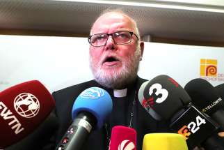 Cardinal Reinhard Marx of Munich speaks to the media Sept. 25 during the German bishops&#039; conference meeting in Fulda, Germany. Cardinal Marx formally apologized for sexual abuse in the church, saying it &quot;has been denied, turned away from and covered up for far too long.&quot;