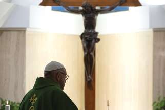  Pope Francis celebrates morning Mass in the chapel of his residence, the Domus Sanctae Marthae, at the Vatican Nov. 27. 