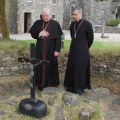 Canadian Cardinal Marc Ouellet, left, and Archbishop Charles Brown, apostolic nuncio to Ireland, visit the &quot;penitential beds&quot; containing the remains of Celtic monastic life at Lough Derg in County Donegal, Ireland, June 12. During his visit to Lough Derg , Cardinal Ouellet, papal delegate to the International Eucharistic Congress, met privately with people who were abused as children by clerics or members of church institutions.