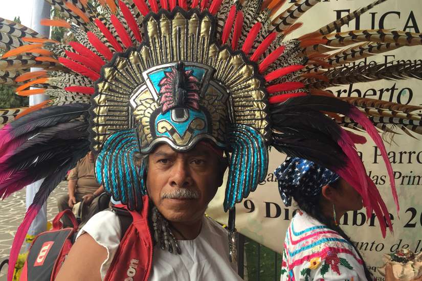 Jose Alfredo Robles, a &quot;conchero&quot; dancer, attends the Dec. 9 feast day for St. Juan Diego at the Basilica of Our Lady of Guadalupe in Mexico City. The indigenous saint has not attracted a large devotion since being canonized in 2002. 