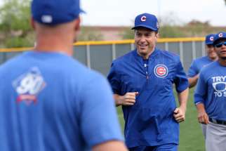 Father Burke Masters, Chicago Cubs&#039; chaplain, takes part in a practice with players during spring training in March 2016 at Sloan Park in Mesa, Ariz. Cubs Manager Joe Maddon invited Father Masters to practice with the team.