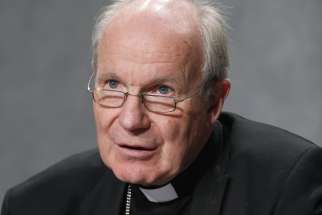 Cardinal Christoph Schönborn of Vienna speaks at a news conference following a session of the Synod of Bishops for the Amazon at the Vatican in this Oct. 21, 2019, file photo. In an interview Feb. 19, 2024, Cardinal Schönborn warned of schism as German bishops planned to keep their reform course despite a letter from the Vatican halting their vote on statutes of a Synodal Committee.