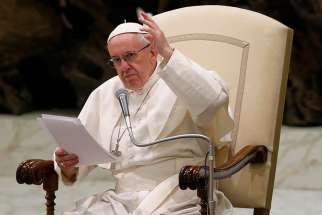 Pope Francis gestures as he leads his general audience in Paul VI hall at the Vatican Feb. 1.