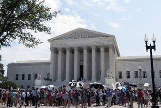 Citizens rallied on the steps of the Supreme Court on Monday (June 30), after it sided with the evangelical owners of Hobby Lobby Stores Inc., ruling 5-4 that the arts-and-crafts chain does not have to offer insurance for types of birth control that conflict with company owners’ religious beliefs. 