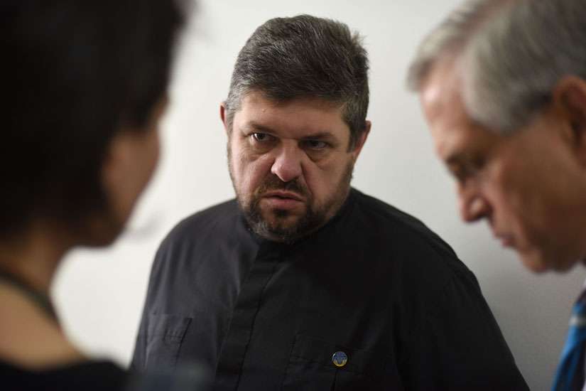 Ukrainian Catholic Father Tykhon Kulbaka , who was held in pro-Russian separatists&#039; captivity for 12 days, speaks with a U.S. delegation June 22 in Lviv. The priest recalled his 12 days in captivity and said the emotional captivity that followed was worse than his physical captivity.