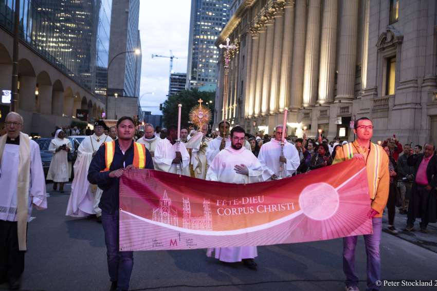 The darkened streets of Montreal came alive June 8 with the annual Corpus Christi procession, the first to take place in four years due to pandemic restrictions.