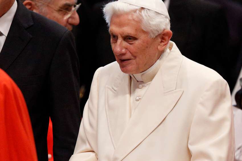 Retired Pope Benedict XVI attends a consistory for the creation of new cardinals in St. Peter&#039;s Basilica at the Vatican in this Feb. 22, 2014, file photo.