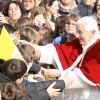 Pope Benedict XVI is greeted by the crowd as he arrives to celebrate Mass at the Church of St. John Baptist de la Salle in Rome March 4. 