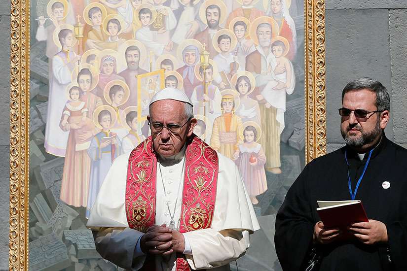 Pope Francis visits the Tsitsernakaberd Memorial in Yerevan, Armenia, June 25. The monument honors the estimaged 1.5 million Armenians killed by Ottoman Turks in 1915-18. The icon behind the pope represents those killed.