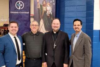 Michael Aguiar, John Pacheco and Nicholas Ferreira of Consortium of Independent Ontario Catholic Schools with Bishop Yvan Mathieu of the Archdiocese of Ottawa-Cornwall