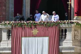 Pope Francis waves to the crowd in St. Peter&#039;s Square before he imparts his Easter blessing &quot;urbi et orbi&quot; (to the city and the world) from the central balcony of St. Peter&#039;s Basilica April 9, 2023.