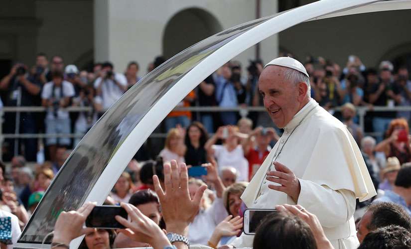 Pope Francis arrives to lead a gathering with young people in Piazza Vittorio in Turin, Italy, June 21.