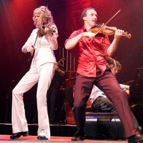 Cape Breton fiddler Natalie MacMaster, left, with her husband Donnell Leahy. MacMaster, a Catholic, will receive an honorary doctor of divinity degree from the Atlantic School of Theology May 4.