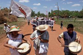 People near San Jose, Bolivia, march to defend Mother Earth Sept. 27, 2019.