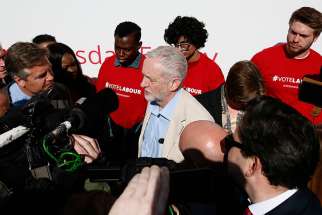 Britain&#039;s opposition Labour Party leader Jeremy Corbyn speaks to members of the media during an election campaign poster launch in London on May 3, 2016.