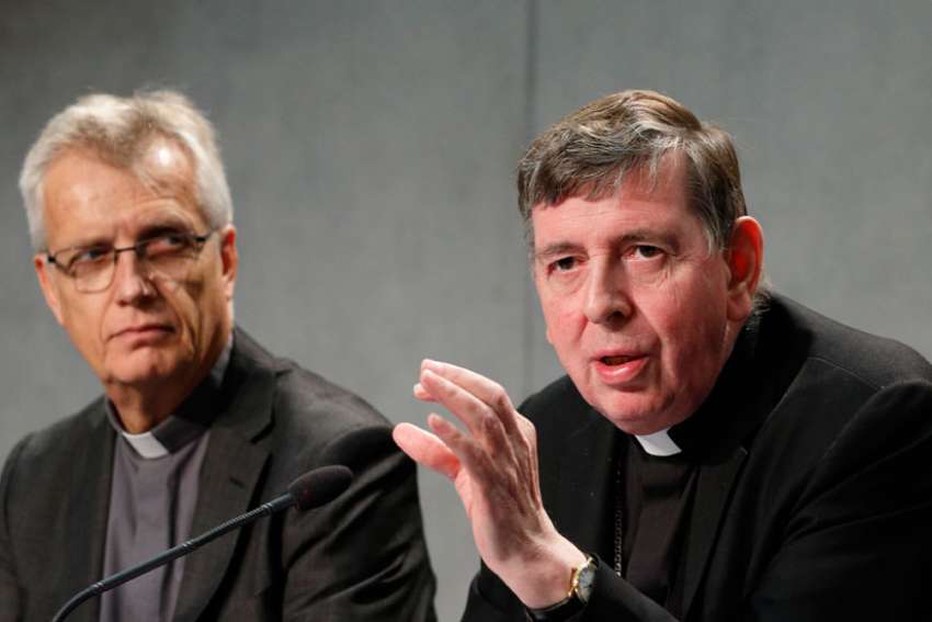 Cardinal Kurt Koch, right, speaks as the Rev. Martin Junge, general secretary of the Lutheran World Federation, looks on during a news conference at the Vatican Oct. 26. During Pope Francis’ trip to Sweden, the cardinal was asked about the possibility of Catholics and Lutherans receiving Communion together.