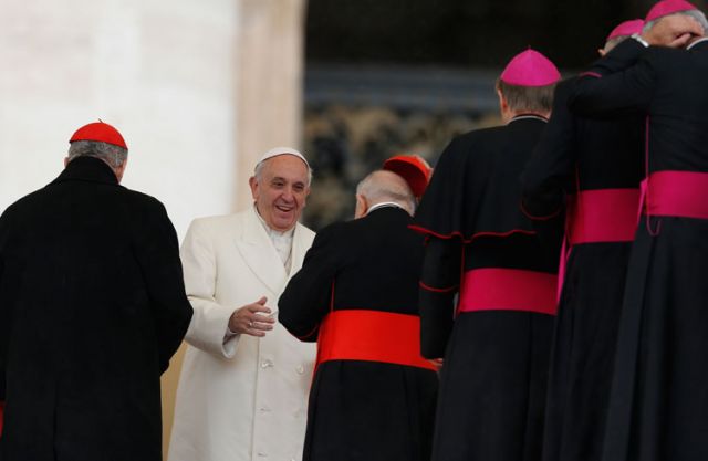 Pope Francis greets cardinals and bishops as he leads his general audience in St. Peter&#039;s Square at the Vatican Jan. 22.