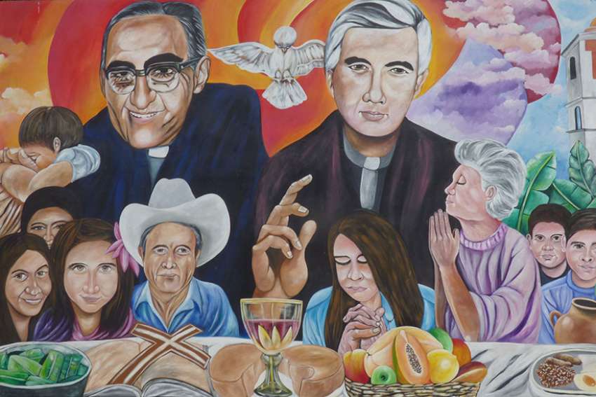 A mural in El Paisnal, El Salvador, seen in this Jan. 29 photo, features Blessed Oscar Romero and town native Father Rutilio Grande, surrounded by rural men, women and children, the community.