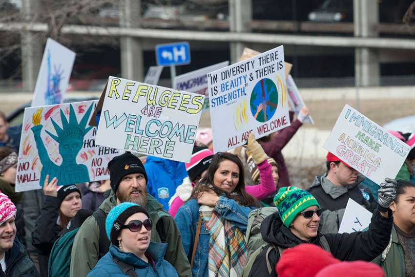 People march in support of immigrants and refugees in Minneapolis, Minnesota. Since 2007, Minnesota has resettled more than 20,700 refugees.