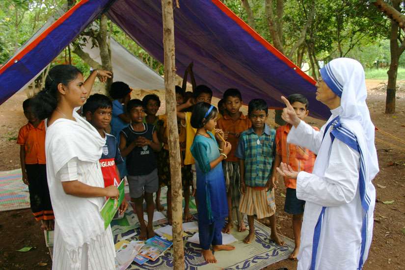 In this 2008 file photo, Missionaries of Charity Sister Nirmala Joshi meets Christian refugees who had been sheltered in Kandhamal, India. Sister Nirmala, 80, died June 23. She would have turned 81 in a month.