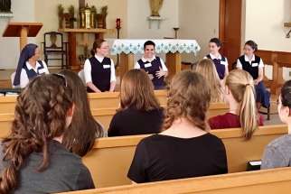 Sisters, novices, and postulants of the Daughters of St. Paul share their experiences with young women at a Vocation Day Camp in North Collins, N.Y.