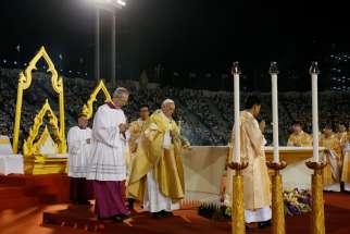 Pope Francis burns incense as he celebrates Mass in National Stadium in Bangkok Nov. 21, 2019.