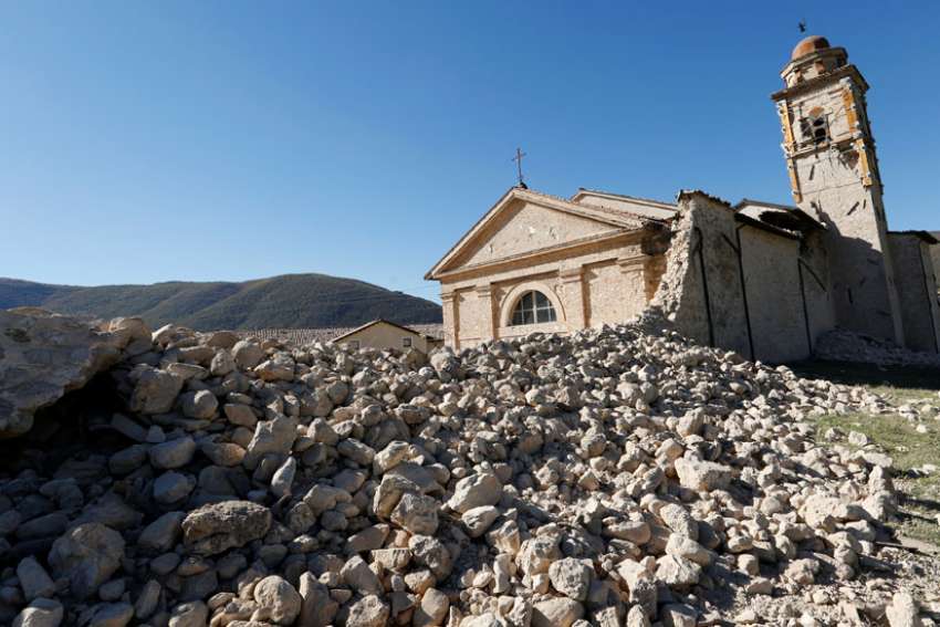 St. Anthony Cchurch is seen Oct. 30 partially collapsed following an earthquake along the road to Norcia, Italy. Thousands of people in central Italy have spent the night in cars, tents and temporary shelters following the fourth earthquake in the area in three months.