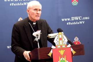 Bishop Mark E. Brennan of Wheeling-Charleston, W.Va., speaks during a news conference at the chancery Nov. 26, 2019, in Wheeling, W.Va.
