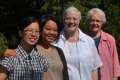 Sisters of Providence postulant Mary Truong, left, stands with Srs. Mae Valdez, Germaine Chalifoux and Elizabeth Kaczmarczyk.