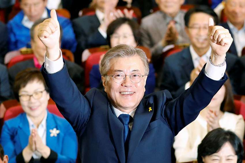 South Korean President-elect Moon Jae-in celebrates in Seoul after declaring victory May 9 in the South Korean presidential election. He was sworn in May 10.