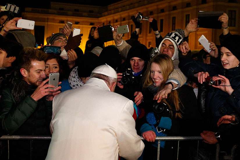Pope Francis greets people after visiting the Nativity scene in St. Peter&#039;s Square after a New Year&#039;s Eve prayer service in St. Peter&#039;s Basilica at the Vatican. 
