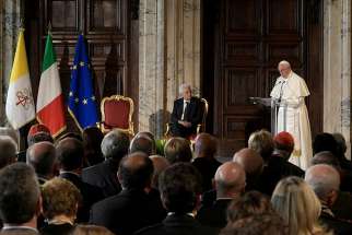 Pope Francis speaks alongside Italian President Sergio Mattarella during an official visit at Quirinal Palace in Rome June 10.