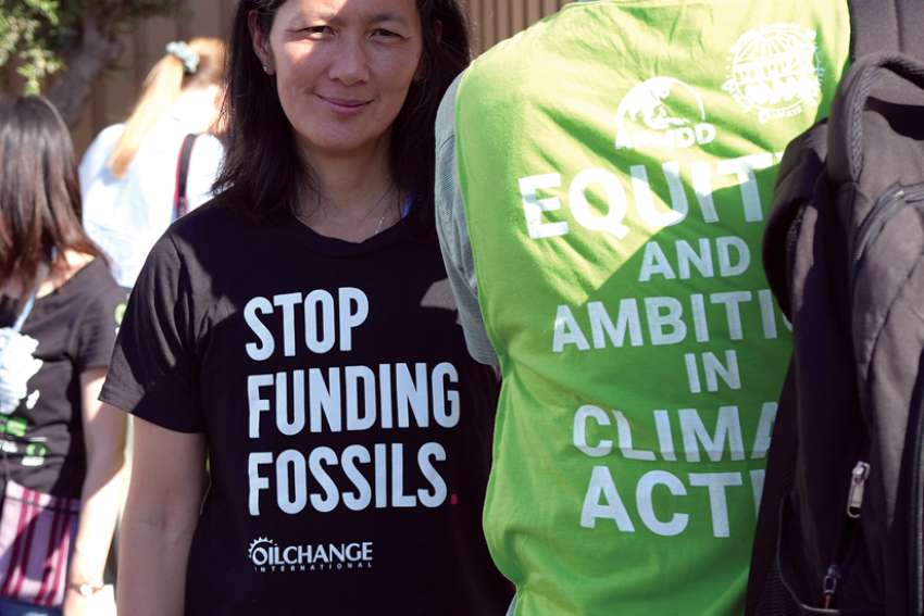 A protester wears a t-shirt with the message “Stop funding fossils” during a demonstration at the COP27 climate summit in Sharm el-Sheikh, Egypt.
