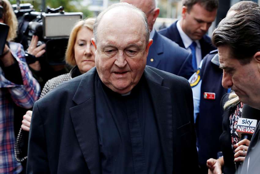Archbishop Philip Wilson of Adelaide, Australia, leaves the Newcastle Local Court July 3. Pope Francis July 30 accepted the resignation of Archbishop Wilson, who had been found guilty by an Australian court of failing to inform police about child sexual abuse allegations.